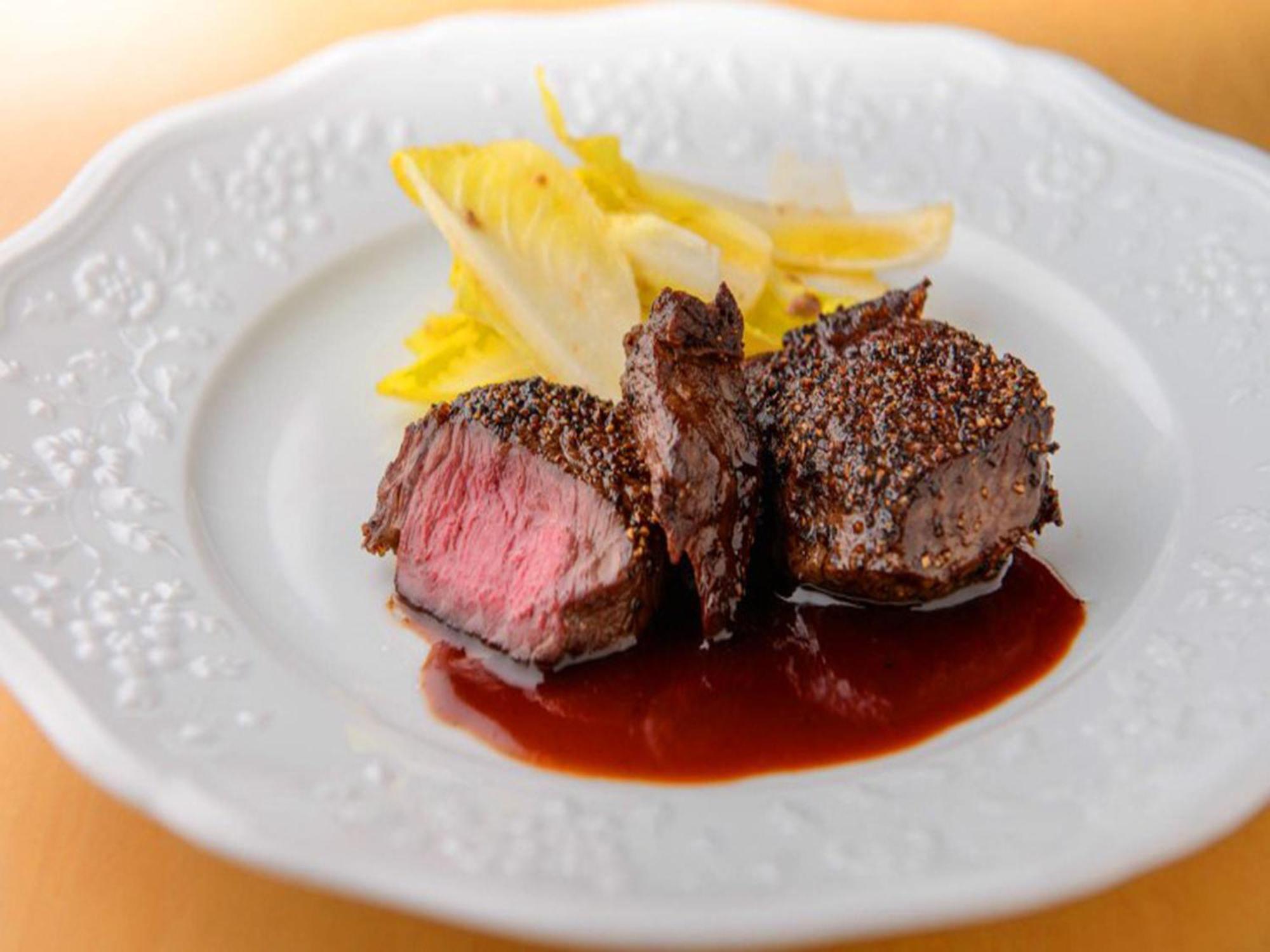 Shin Furano Prince Hotel Екстер'єр фото A steak prepared using the dry-aging technique